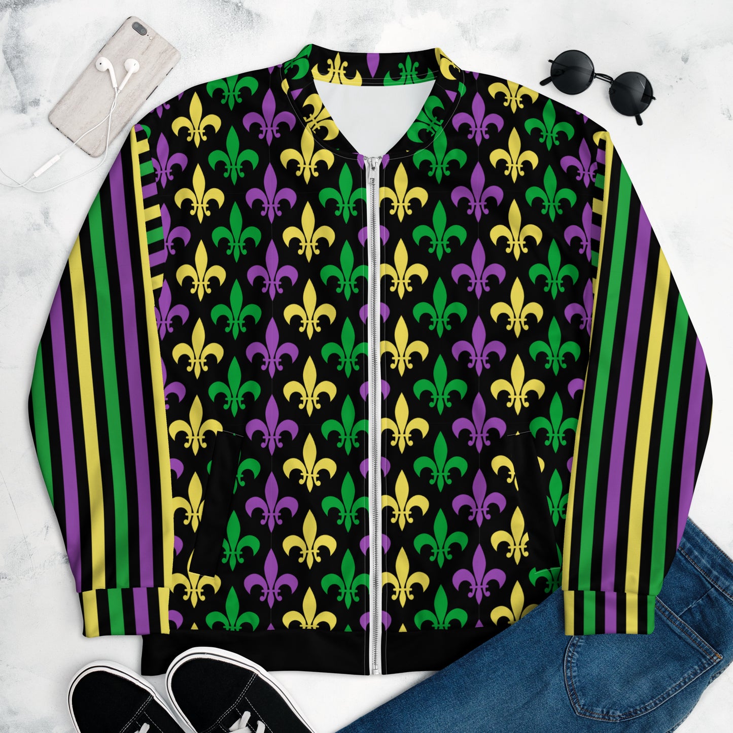 Image: Mardi Gras Unisex Bomber Jacket. This lightweight NOLA apparel is perfect for parades in the French Quarter, or Mardi Gras themed fun runs. It features a gold, green and purple fleur de lis pattern on the front and back, with gold, purple and green stripes going down each arm. Plus sizes available, by jaecrece