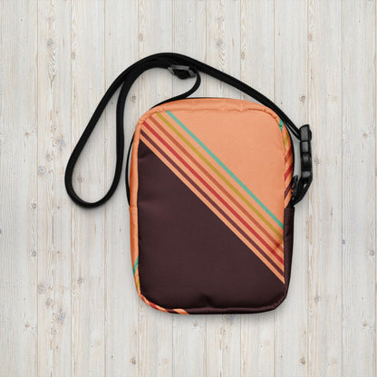 Image: This versatile Colorblock Canvas Crossbody Bag has a grandpacore aesthetic, with peach and brown water resistant canvas and rainbow design. This small fanny pack is designed for women, teens, and tweens who love a grandpacore funky aesthetic. Whether you need a small camera pouch for hands free adventures, a compact mini backpack for festivals, or an everyday sling bag for errands, this is the ultimate go to accessory!