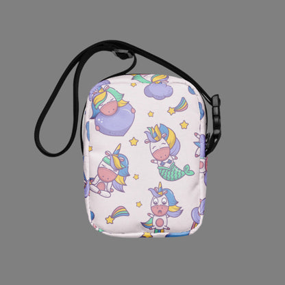 Image: Pink Unicorn Mermaid Kawaii Small Purse, this canvas crossbody has a light pink background with graphics of Unicorn mermaids, stars and rainbows. The perfect gift for tween girls, by jaecrece