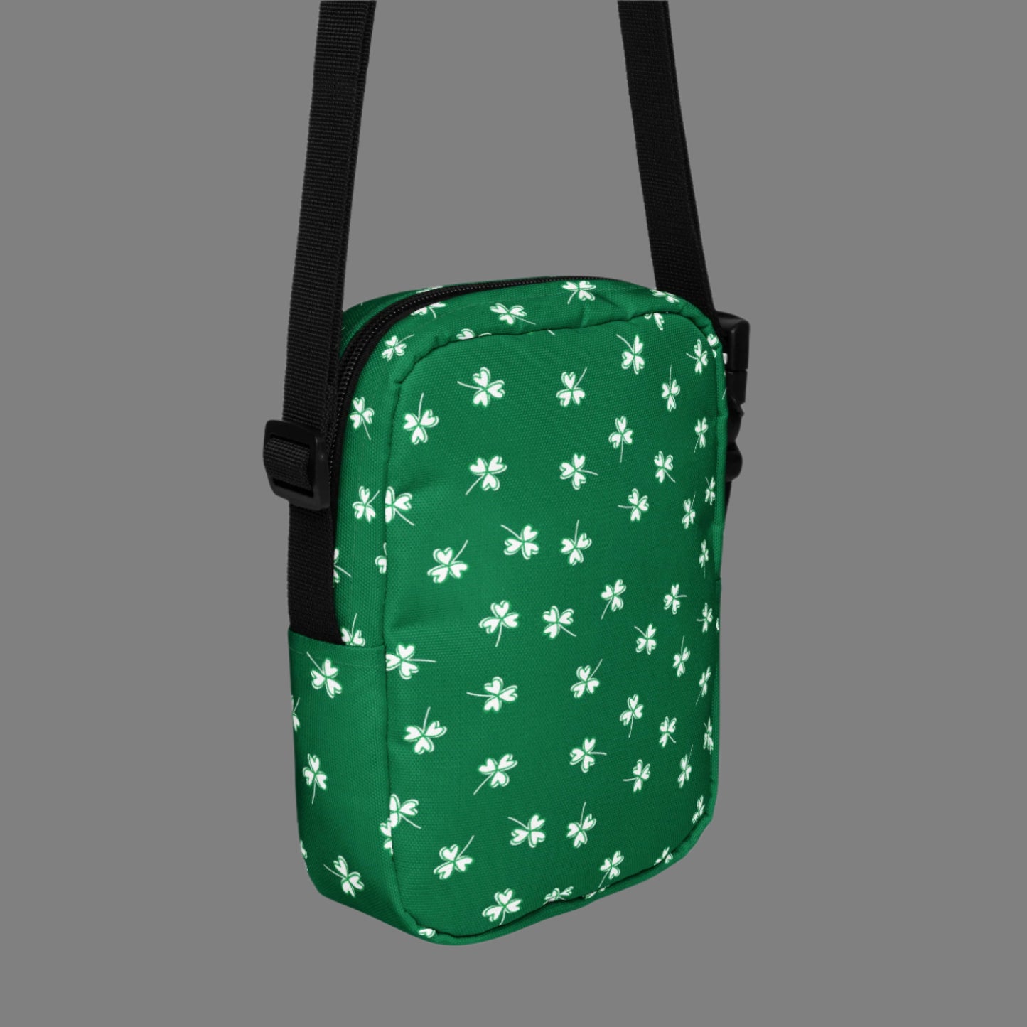 Image: St Patricks Day Fanny Pack. This green small crossbody bag is green, with a pattern of white shamrocks. Our four leaf clover small canvas tote makes a great gift for men, women, teens and kids. Its a great hands free pouch for your camera and phone at Irish festivals and St Pattys Day parades, by jaecrece