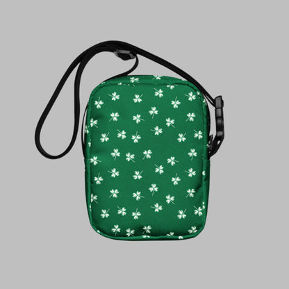 Image: St Patricks Day Fanny Pack. This green small crossbody bag is green, with a pattern of white shamrocks. Our four leaf clover small canvas tote makes a great gift for men, women, teens and kids. Its a great hands free pouch for your camera and phone at Irish festivals and St Pattys Day parades, by jaecrece