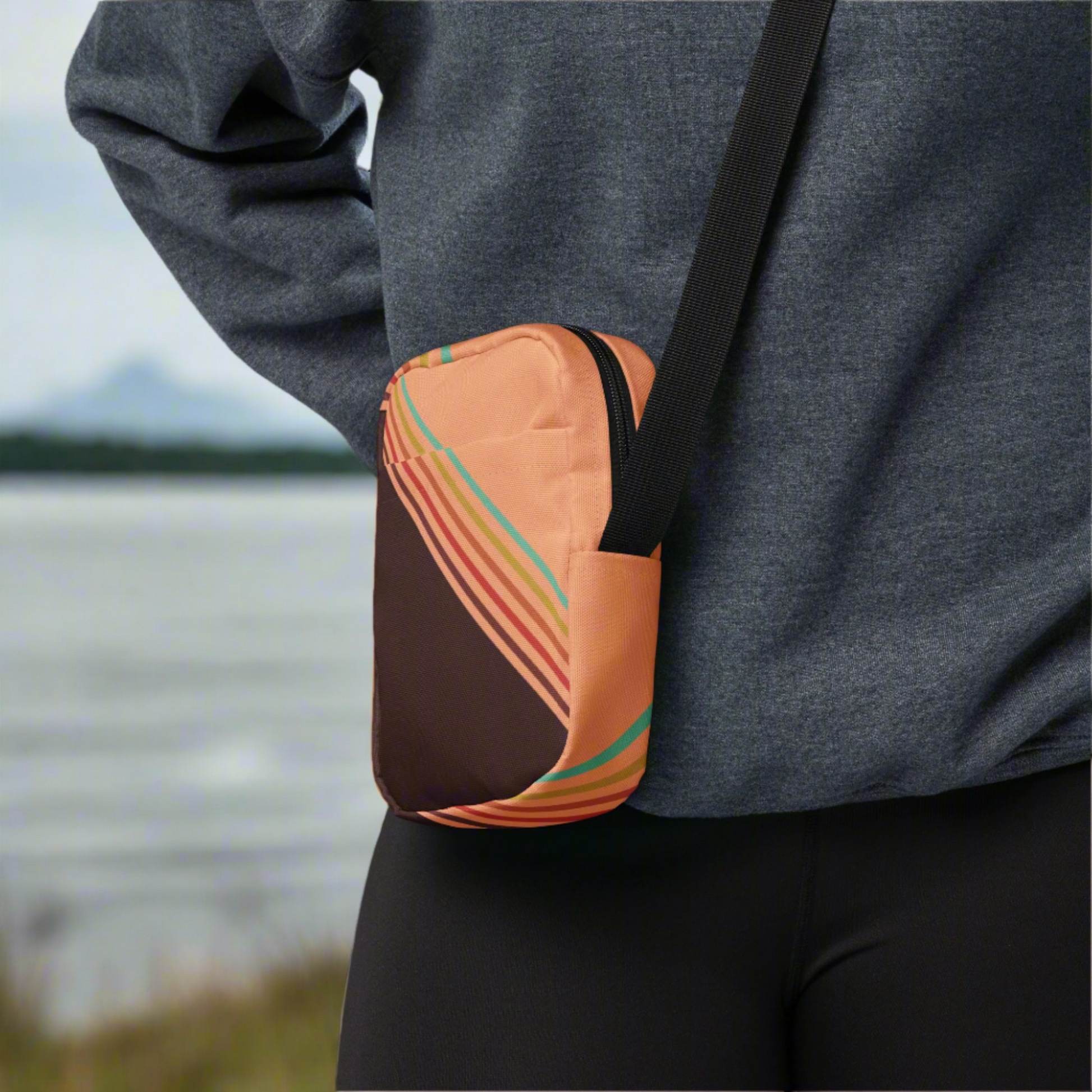 Image: This versatile Colorblock Canvas Crossbody Bag has a grandpacore aesthetic, with peach and brown water resistant canvas and rainbow design. This small fanny pack is designed for women, teens, and tweens who love a grandpacore funky aesthetic. Whether you need a small camera pouch for hands free adventures, a compact mini backpack for festivals, or an everyday sling bag for errands, this is the ultimate go to accessory!