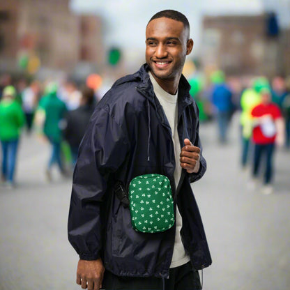 Image: St Patricks Day Fanny Pack. This green small crossbody bag is green, with a pattern of white shamrocks. Our four leaf clover small canvas tote makes a great gift for men, women, teens and kids. Its a great hands free pouch for your camera and phone at Irish festivals and St Pattys Day parades, by jaecrece