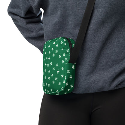 Image: St Patricks Day Fanny Pack. This green small crossbody bag is green, with a pattern of white shamrocks. Our four leaf clover small canvas tote makes a great gift for men, women, teens and kids. Its a great hands free pouch for your camera and phone at Irish festivals and St Pattys Day parades, by jaecrece