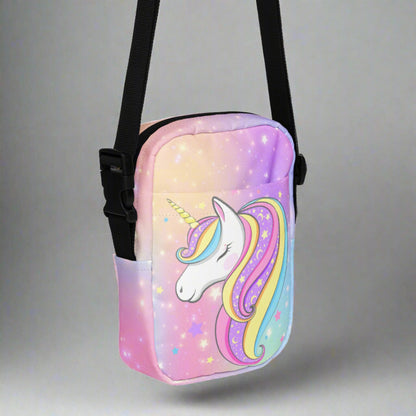 Image: canvas utility small crossbody bag: pink purple blue star pattern, with a fairy tale mythical unicorn. Whimsical Birthday or Christmas Gift for girls or tweens. May be worn as a sling, on hips or waist. Fanny pack or mini backpack, by jaecrece