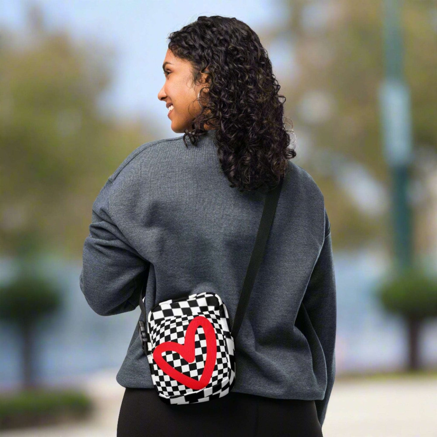 Black and white checkerboard patterned canvas crossbody utility bag with a red heart, by jaecrece.com