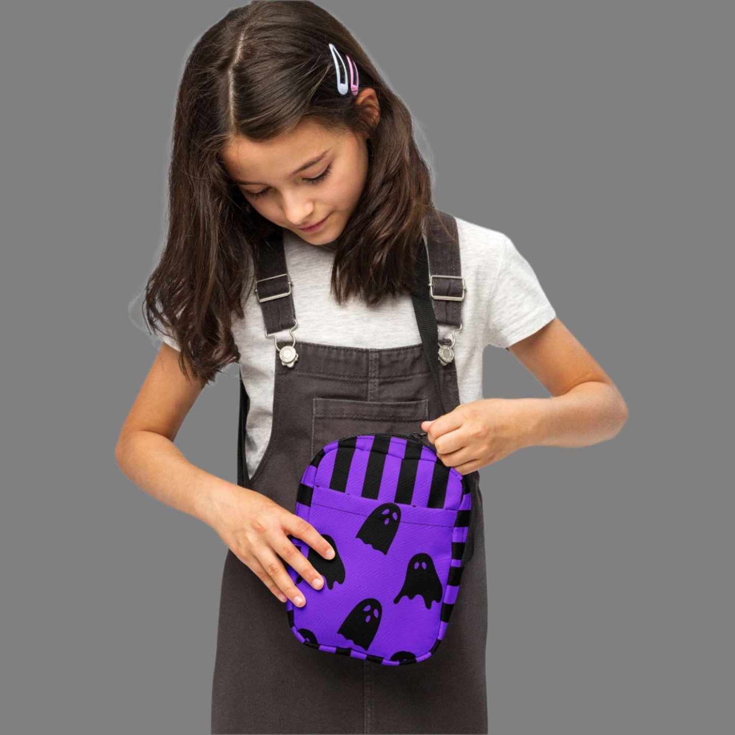 Cute Ghost Small Canvas Crossbody Bag, Ghost and Black Stripes Halloween Utility Bag, This bag has a strap that may be worn crossbody, or on hips/ waist. This purple and black water resistant fanny pack can be used as a camera or cell phone holder, by jaecrece