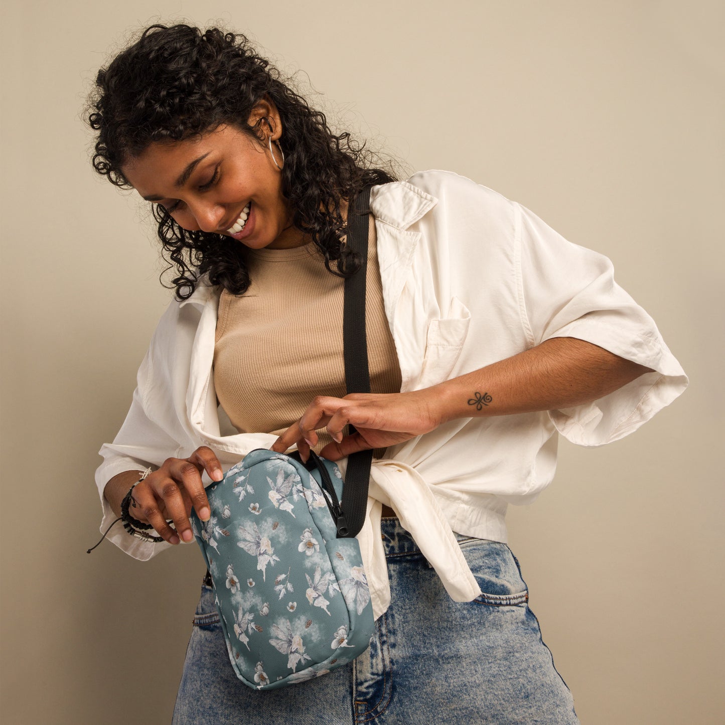 Grey small canvas crossbody utility bag, with a repeating fairy, floral and pinecone pattern. This hiking biking small tote can be worn on the hips, waist or cross the chest. The perfect gift or festival pouch for ladies, teens and tween. By jaecrece