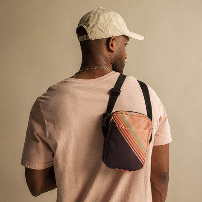 Image: This versatile Colorblock Canvas Crossbody Bag has a grandpacore aesthetic, with peach and brown water resistant canvas and rainbow design. This small fanny pack is designed for women, teens, and tweens who love a grandpacore funky aesthetic. Whether you need a small camera pouch for hands free adventures, a compact mini backpack for festivals, or an everyday sling bag for errands, this is the ultimate go to accessory!