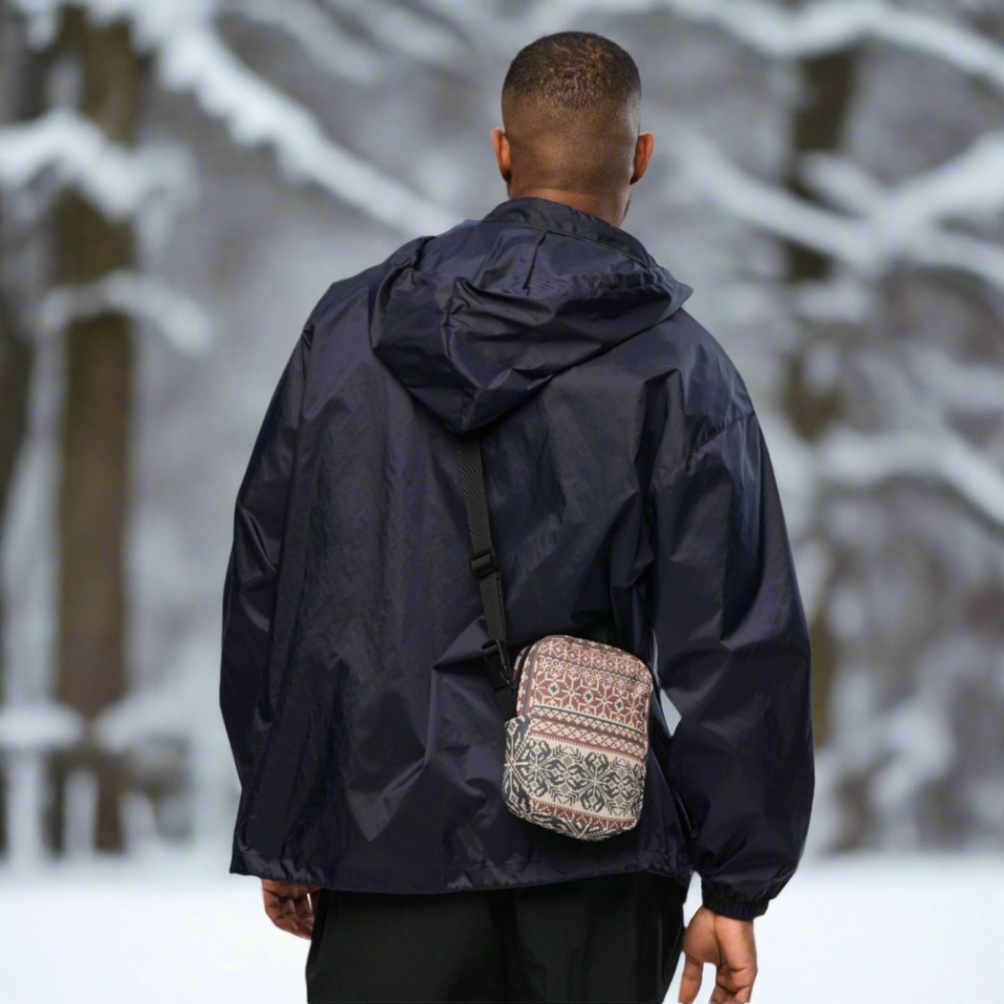 Image: Fair Isle Crossbody Bag. This small canvas tote has a Scandanavian geometric pattern of snowflakes in maroon and navy blue. It may be worn across the hips, waist, chest or as a mini backpack, by jaecrece