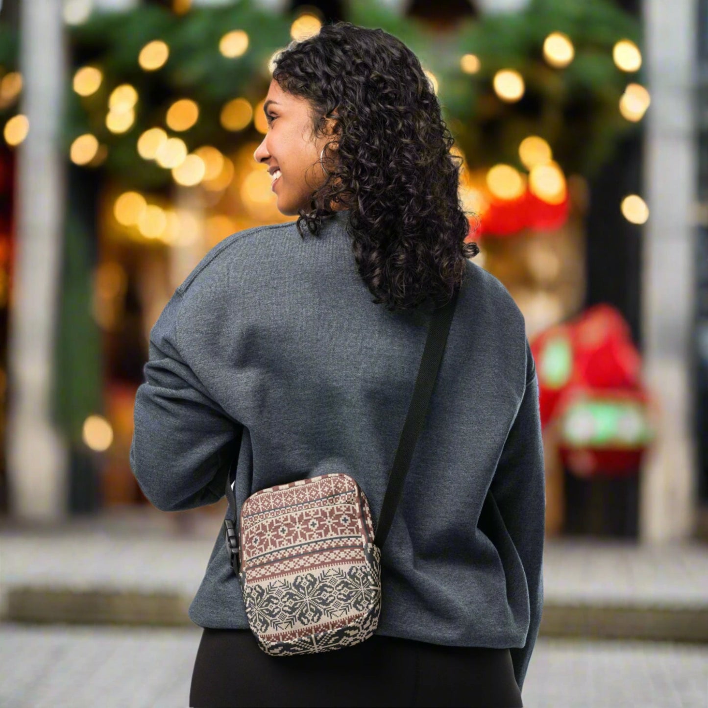 Image: Fair Isle Crossbody Bag. This small canvas tote has a Scandanavian geometric pattern of snowflakes in maroon and navy blue. It may be worn across the hips, waist, chest or as a mini backpack, by jaecrece