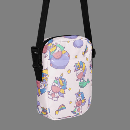 Image: Pink Unicorn Mermaid Kawaii Small Purse, this canvas crossbody has a light pink background with graphics of Unicorn mermaids, stars and rainbows. The perfect gift for tween girls, by jaecrece