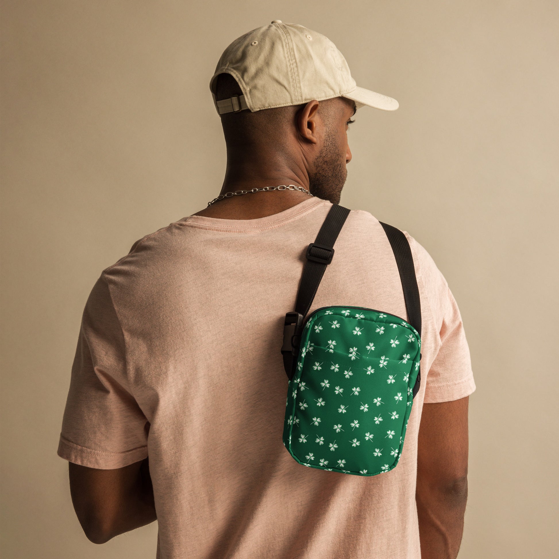 Image: St Patricks Day Fanny Pack. This green small crossbody bag is green, with a pattern of white shamrocks. Our four leaf clover small canvas tote makes a great gift for men, women, teens and kids. Its a great hands free pouch for your camera and phone at Irish festivals and St Pattys Day parades, by jaecrece