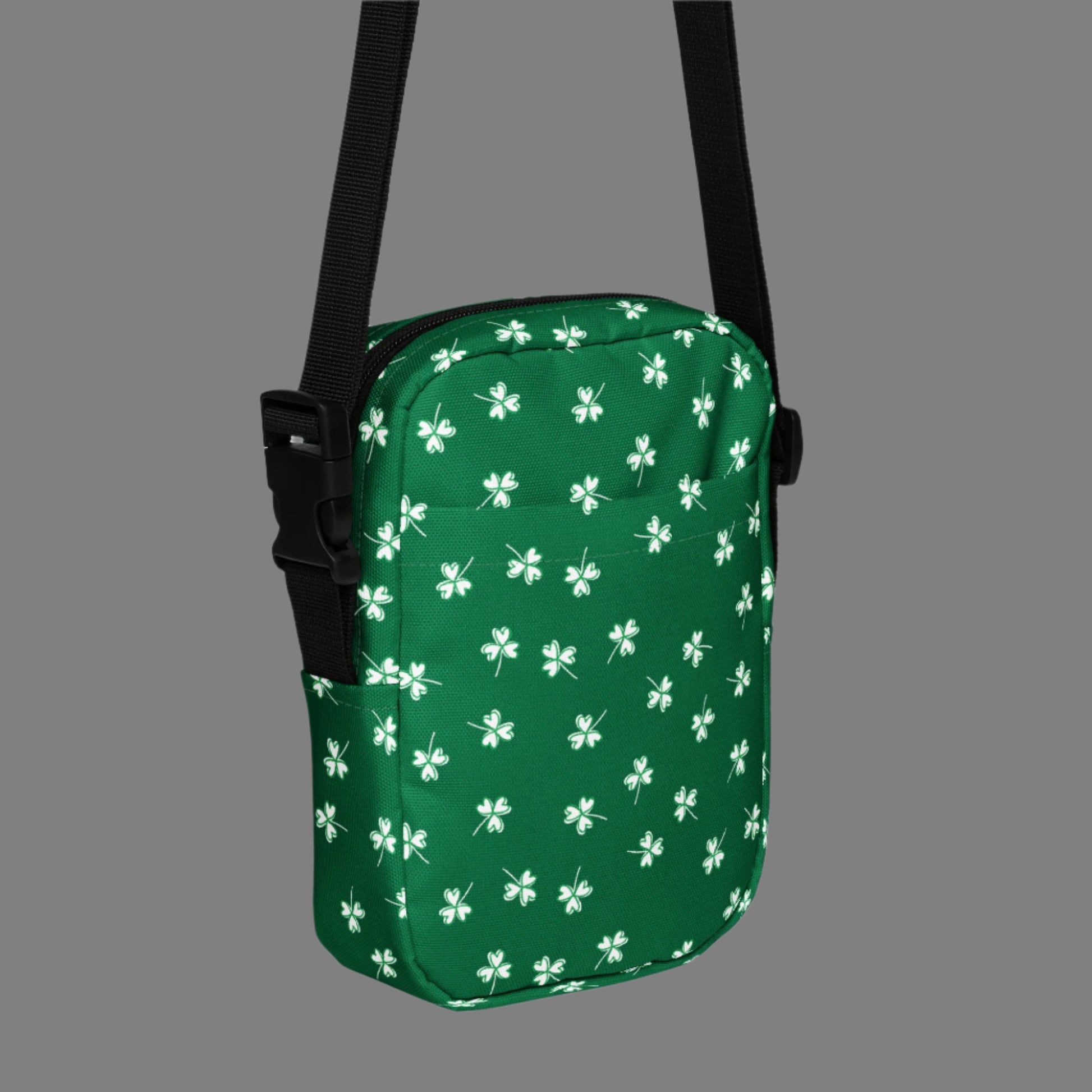 Image: St Patricks Day Fanny Pack. This green small crossbody bag is green, with a pattern of white shamrocks. Our four leaf clover small canvas tote makes a great gift for men, women, teens and kids. Its a great hands free pouch for your camera and phone at Irish festivals and St Pattys Day parades, by jaecrece