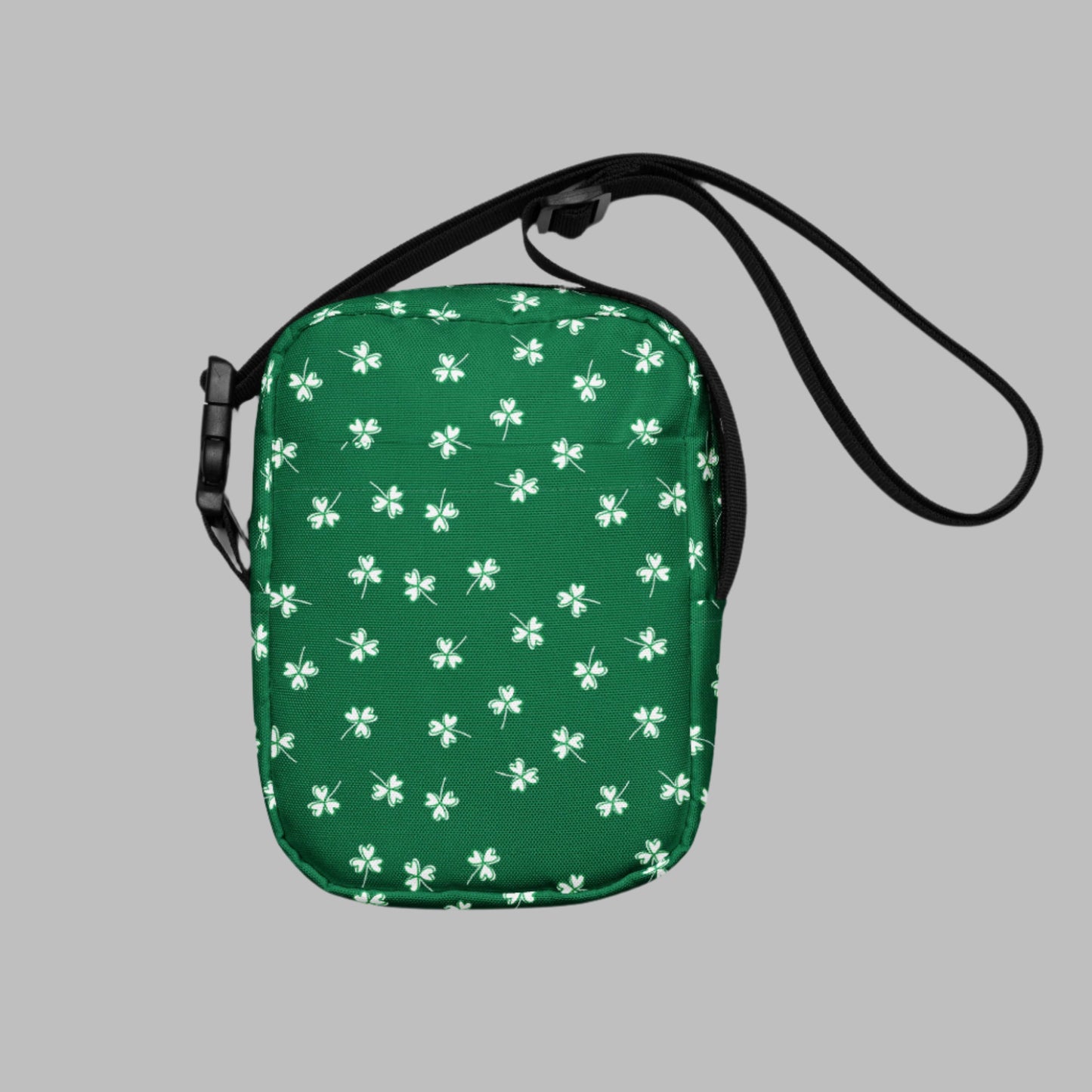 Image: St Patricks Day Fanny Pack. This green small crossbody bag is green, with a pattern of white shamrocks. Our four leaf clover small canvas tote makes a great gift for men, women, teens and kids. Its a great hands free pouch for your camera and phone at Irish festivals and St Pattys Day parades, by jaecrece