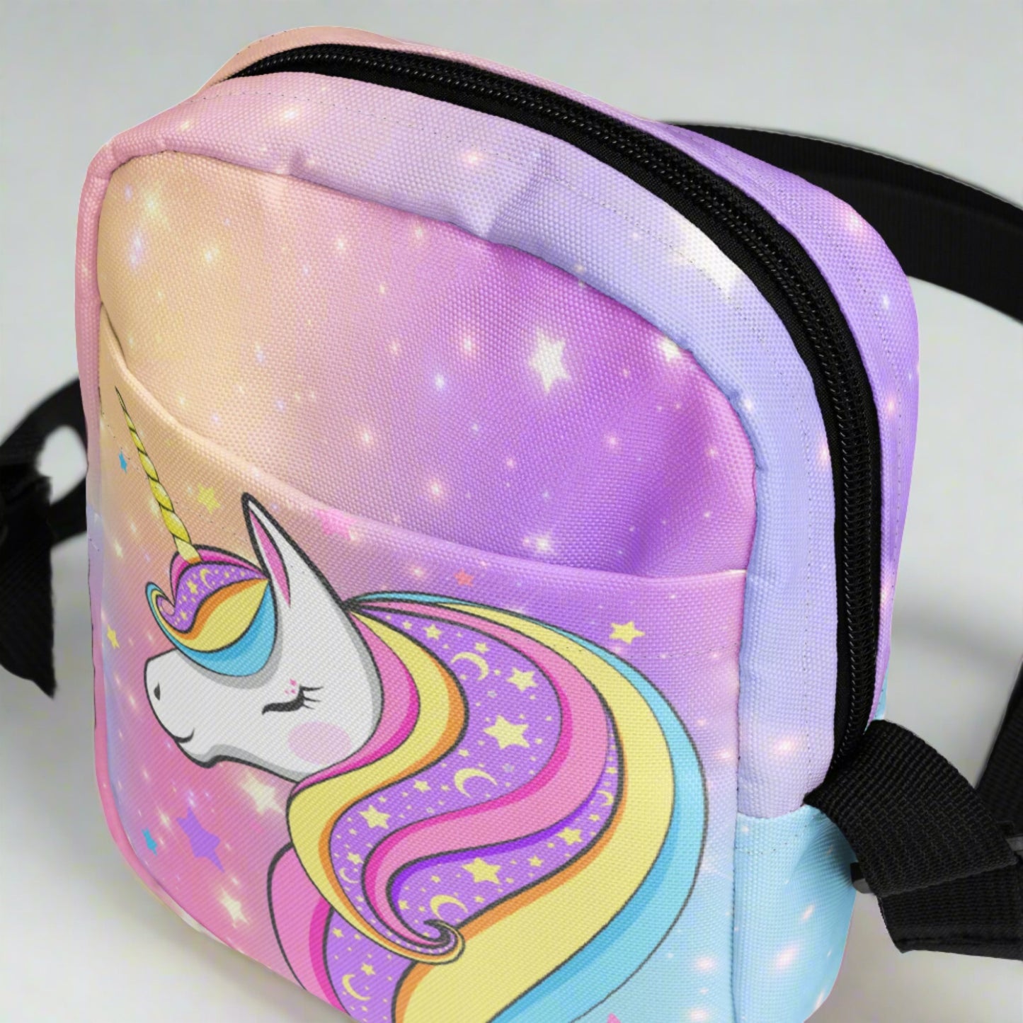 Image: canvas utility small crossbody bag: pink purple blue star pattern, with a fairy tale mythical unicorn. Whimsical Birthday or Christmas Gift for girls or tweens. May be worn as a sling, on hips or waist. Fanny pack or mini backpack, by jaecrece