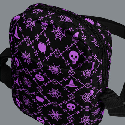 Our Wickedly Cute Halloween Crossbody Utility Bag is made with black water resistant canvas, and features an adorable Halloween themed purple pattern of spider webs, skulls, witch hats and pumpkins. These make a perfect gift for adults, teens and tweens. by jaecrece.com