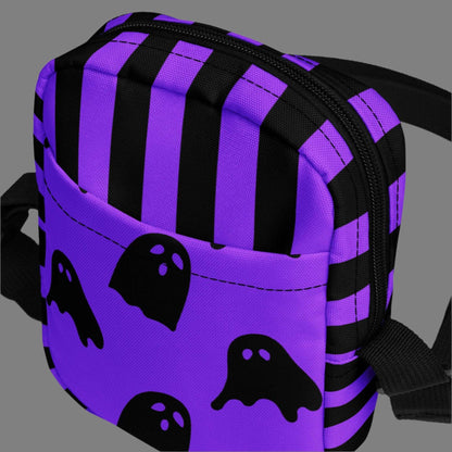 Cute Ghost Small Canvas Crossbody Bag, Ghost and Black Stripes Halloween Utility Bag, This bag has a strap that may be worn crossbody, or on hips/ waist. This purple and black water resistant fanny pack can be used as a camera or cell phone holder, by jaecrece