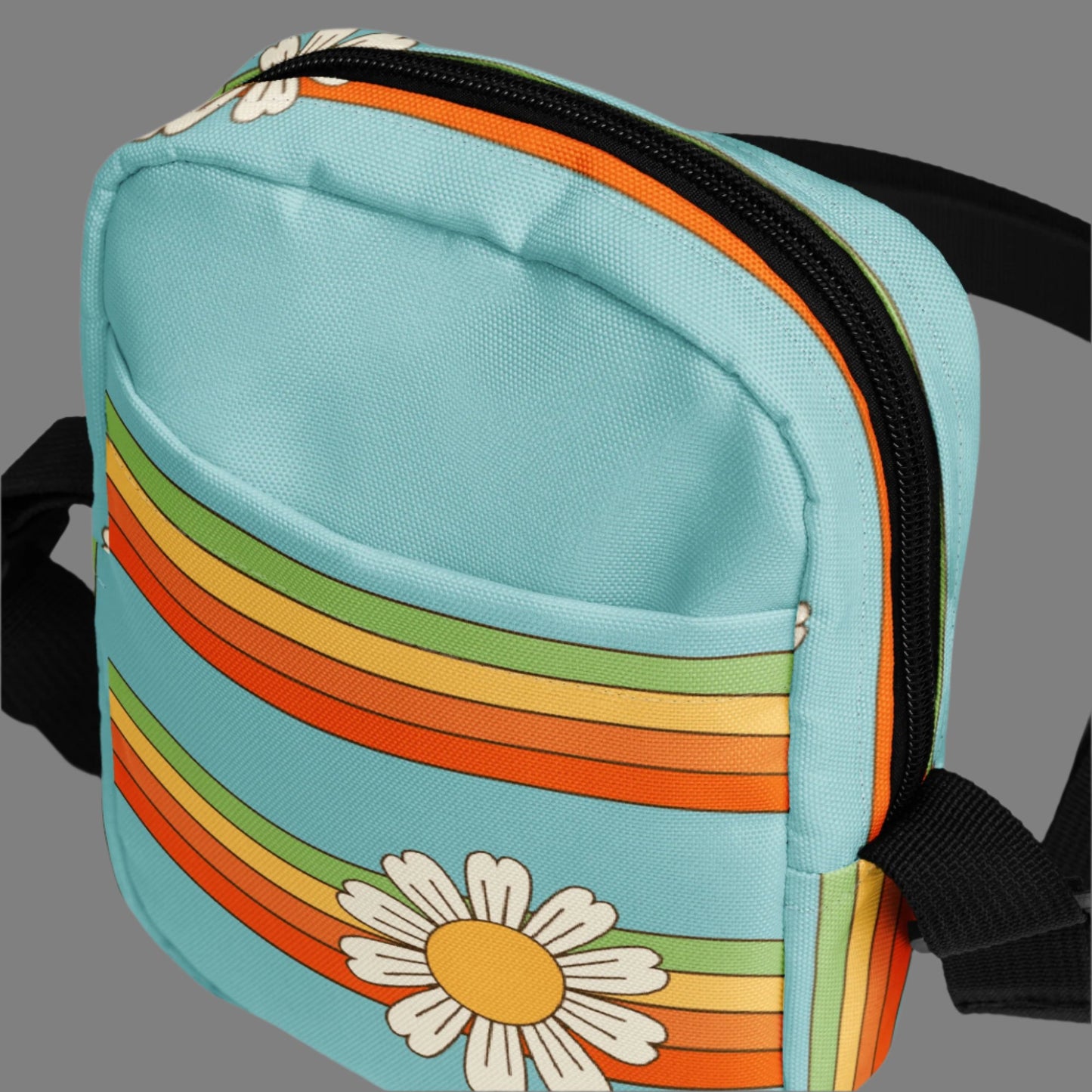 Rainbow & Daisy Canvas Utility Crossbody bag is light blue, with a retro rainbow and daisy pattern. With two storage pockets and a two way zipper, this small tote is perfect for adventures, by jaecrece