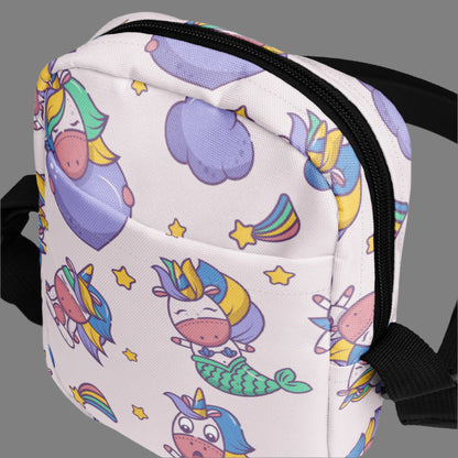 Image: Pink Unicorn Mermaid Kawaii Small Purse, this canvas crossbody has a light pink background with graphics of Unicorn mermaids, stars and rainbows. The perfect gift for tween girls, by jaecrece