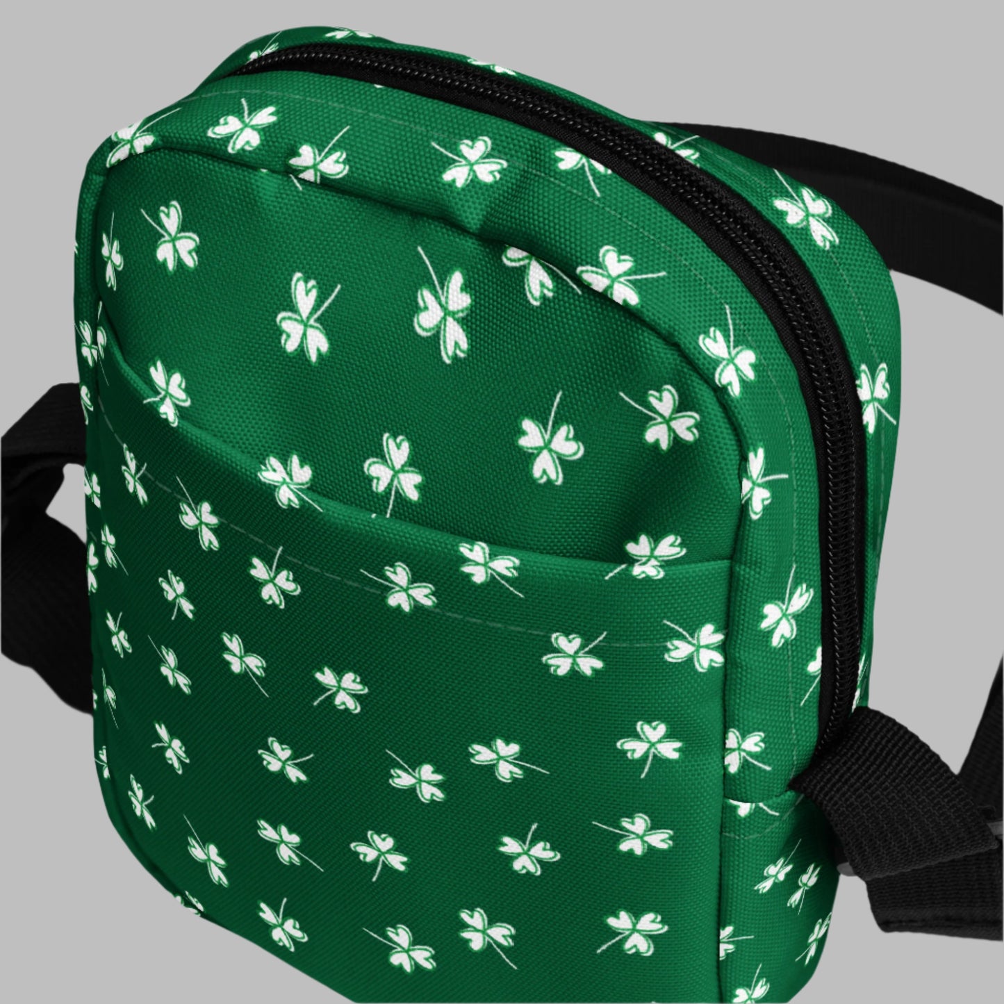 Image: St Patricks Day Fanny Pack. This green small crossbody bag is green, with a pattern of white shamrocks. Our four leaf clover small canvas tote makes a great gift for men, women, teens and kids. Its a great hands free pouch for your camera and phone at Irish festivals and St Pattys Day parades, by jaecrece