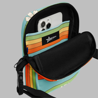 Rainbow & Daisy Canvas Utility Crossbody bag is light blue, with a retro rainbow and daisy pattern. With two storage pockets and a two way zipper, this small tote is perfect for adventures, by jaecrece