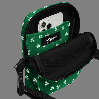 Image: St Patricks Day Fanny Pack. This green small crossbody bag is green, with a pattern of white shamrocks. Our four leaf clover small canvas tote makes a great gift for men, women, teens and kids. Its a great hands free pouch for your camera and phone at Irish festivals and St Pattys Day parades, by jaecrece