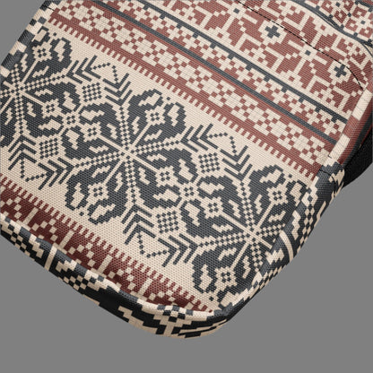 Image: Fair Isle Crossbody Bag. This small canvas tote has a Scandanavian geometric pattern of snowflakes in maroon and navy blue. It may be worn across the hips, waist, chest or as a mini backpack, by jaecrece