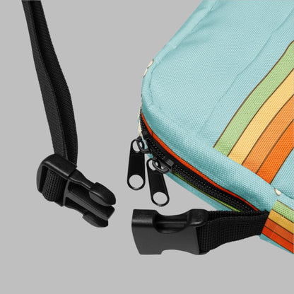 Rainbow & Daisy Canvas Utility Crossbody bag is light blue, with a retro rainbow and daisy pattern. With two storage pockets and a two way zipper, this small tote is perfect for adventures, by jaecrece