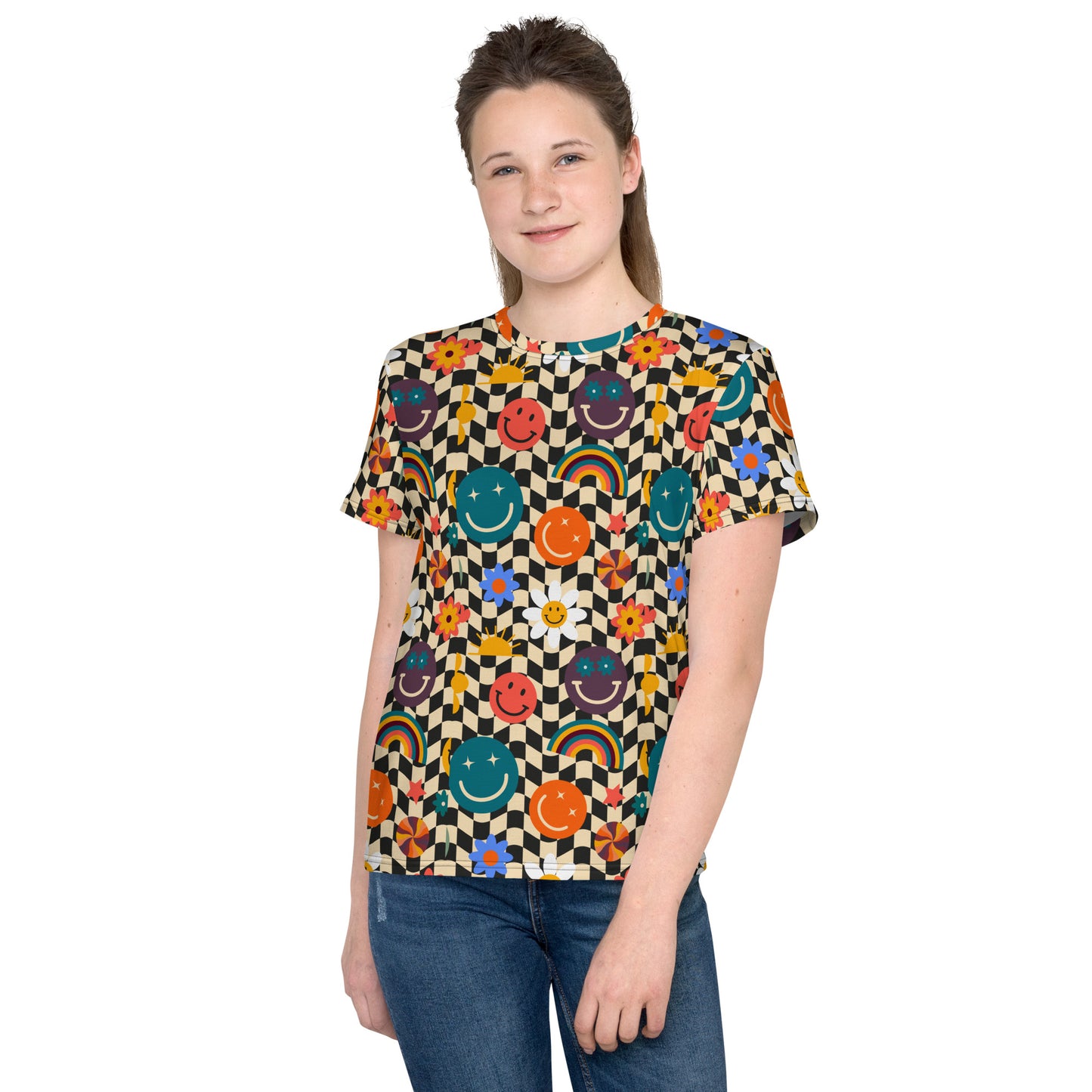 Smiley Face Checkerboard Youth Shirt, size 8-20. This cute retro shirt features a black and khaki checkerboard background, with smiley face, rainbow and daisy graphics. In tween and teen sizes. by jaecrece.com