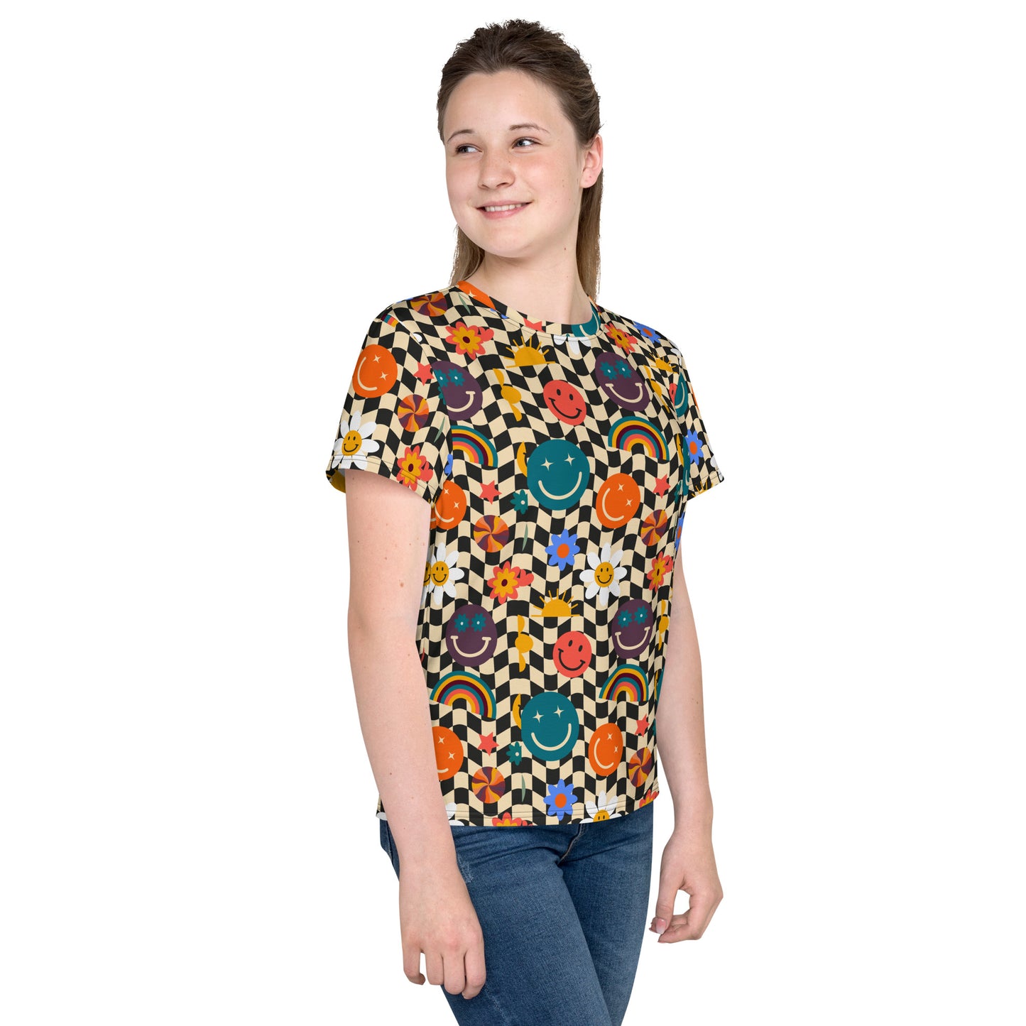 Smiley Face Checkerboard Youth Shirt, size 8-20. This cute retro shirt features a black and khaki checkerboard background, with smiley face, rainbow and daisy graphics. In tween and teen sizes. by jaecrece.com