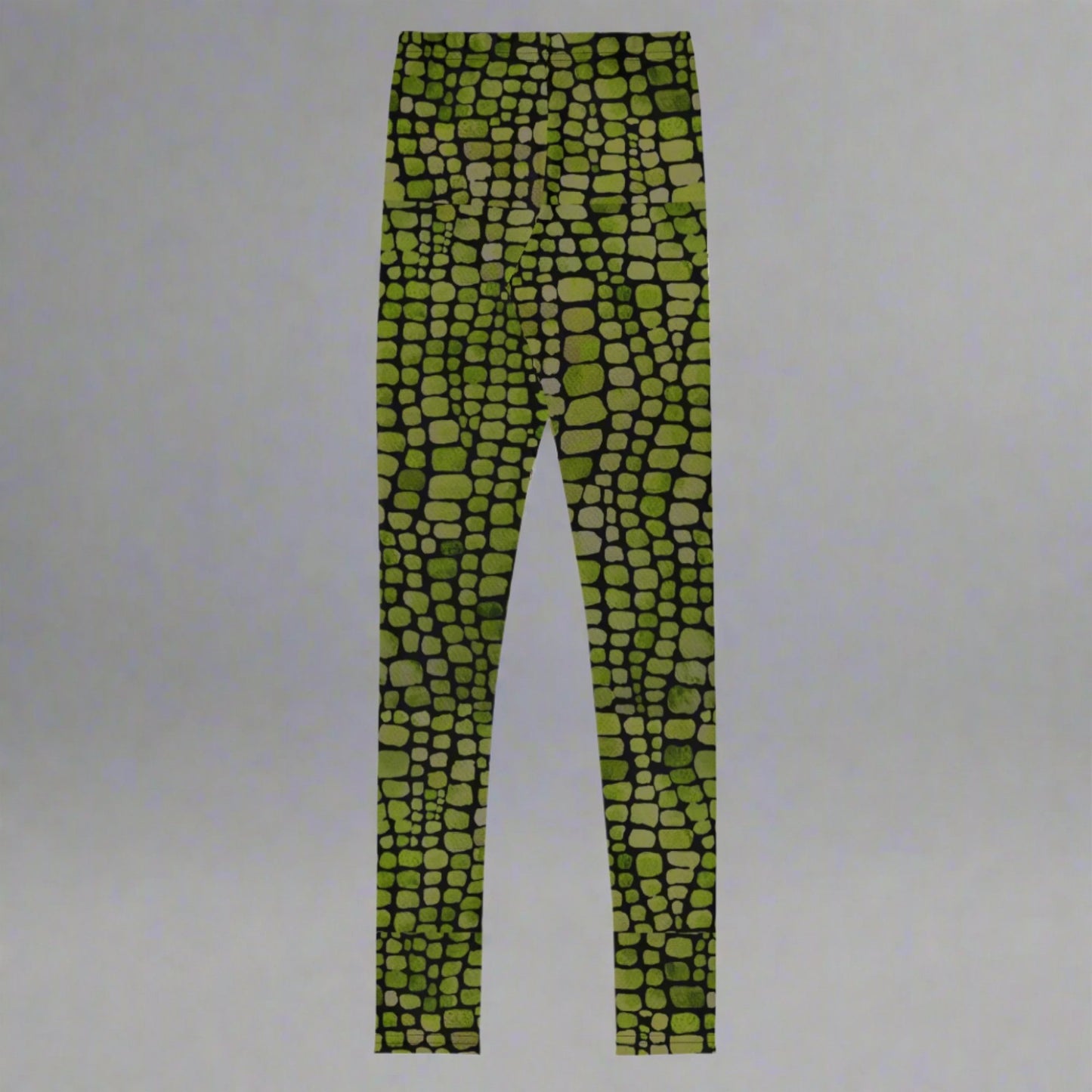 Reptile print youth girls leggings, size 8-20. These green yoga pants have a black reptile print pattern. These tights are available in plus/ extended sizes, and are perfect for casual wear, cosplay, Halloween Trick or treating or yoga class. Similar to a snake, lizard or dinosaur print, by jaecrece