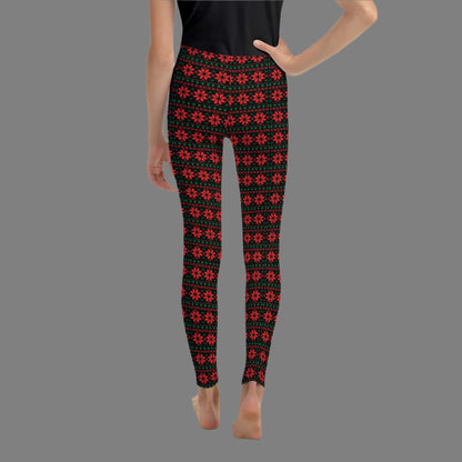 Christmas Poinsettia Toddler Leggings. Sizes 8, 10, 12, 14, 16, 18 and 20. Black leggings with an ugly sweater red and green poinsettia holiday pattern, by jaecrece