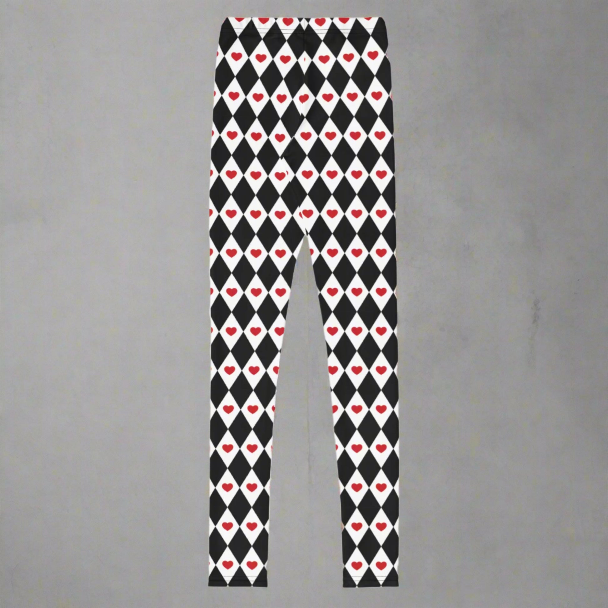 Image: Black and white harlequin check youth leggings with red heart accents. These yoga pants are designed for comfort and flexibility, by jaecrece