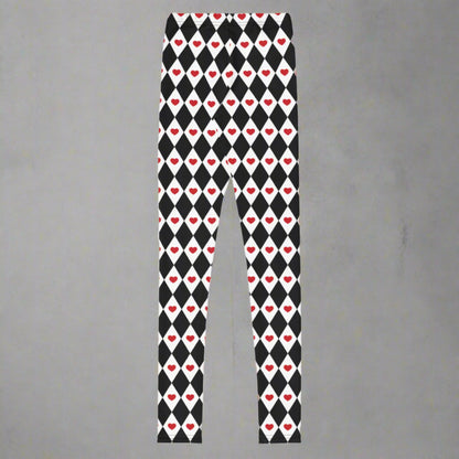 Image: Black and white harlequin check youth leggings with red heart accents. These yoga pants are designed for comfort and flexibility, by jaecrece