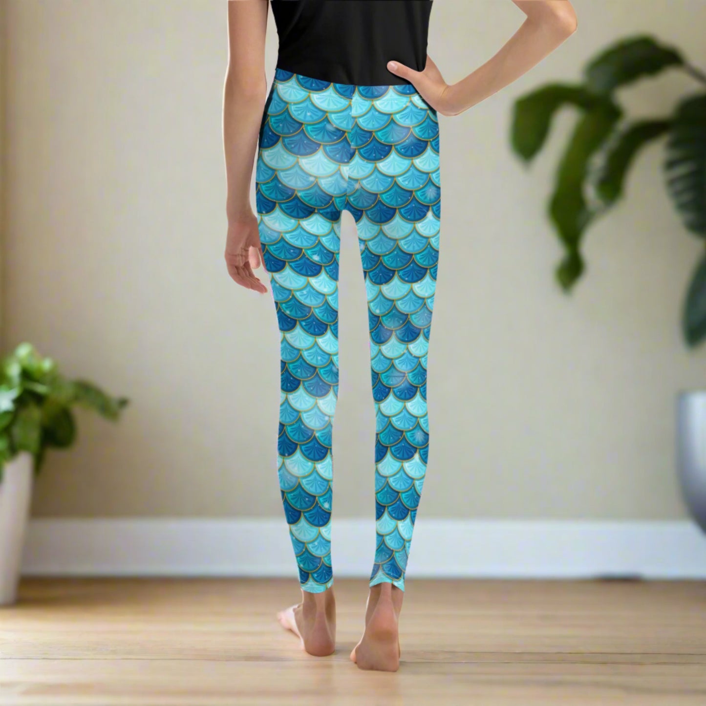 Image: Mermaid Youth Girls Leggings  feature a stunning blue scale print, perfect for tweens and teens in sizes 8-20. Perfect for girls who love the mermaid aesthetic, by jaecrece