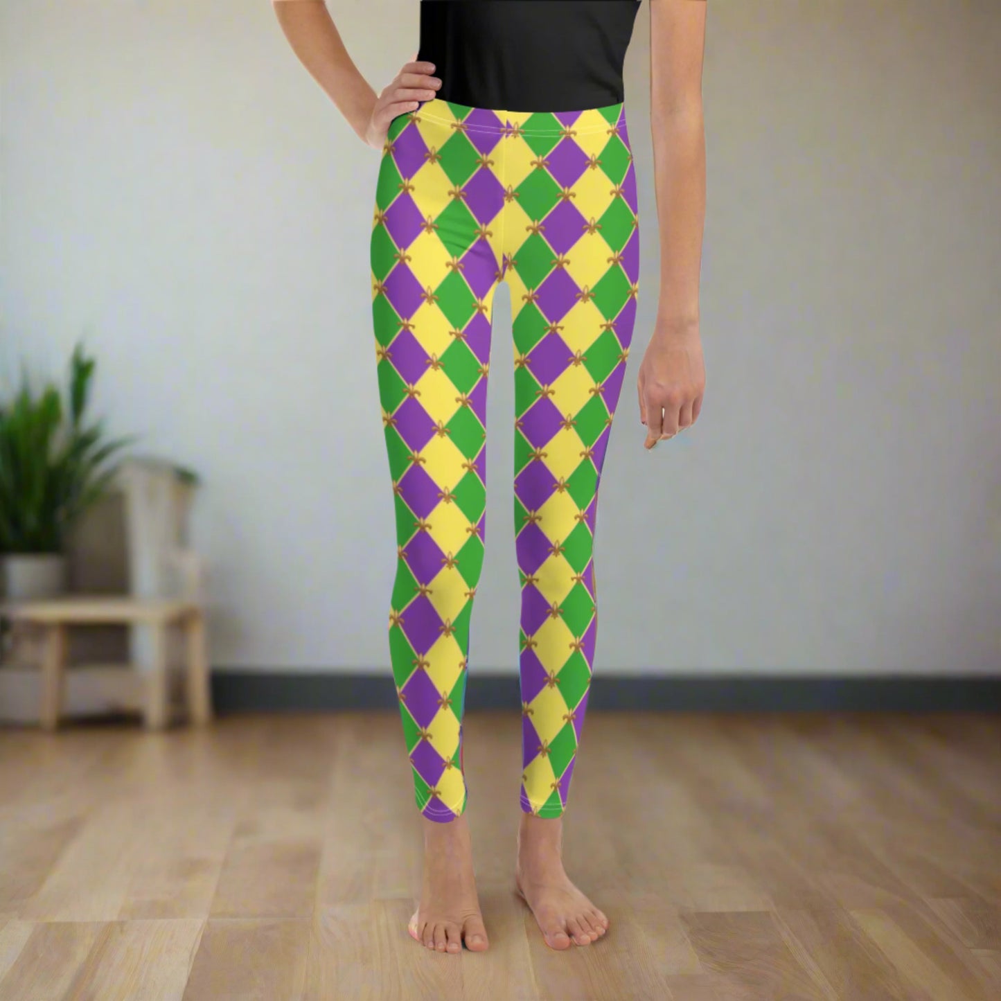 image: Youth girls harlequin diamond or checkerboard pattern leggings in purple, green and gold, with a repeating Fleur de Lis pattern, by jaecrece
Mardi Gras Leggings, Fat Tuesday Tights, teen Parade Outfit, Yoga Workout Pants, Mommy Me Match, New Orleans Tween Girl NOLA Costume