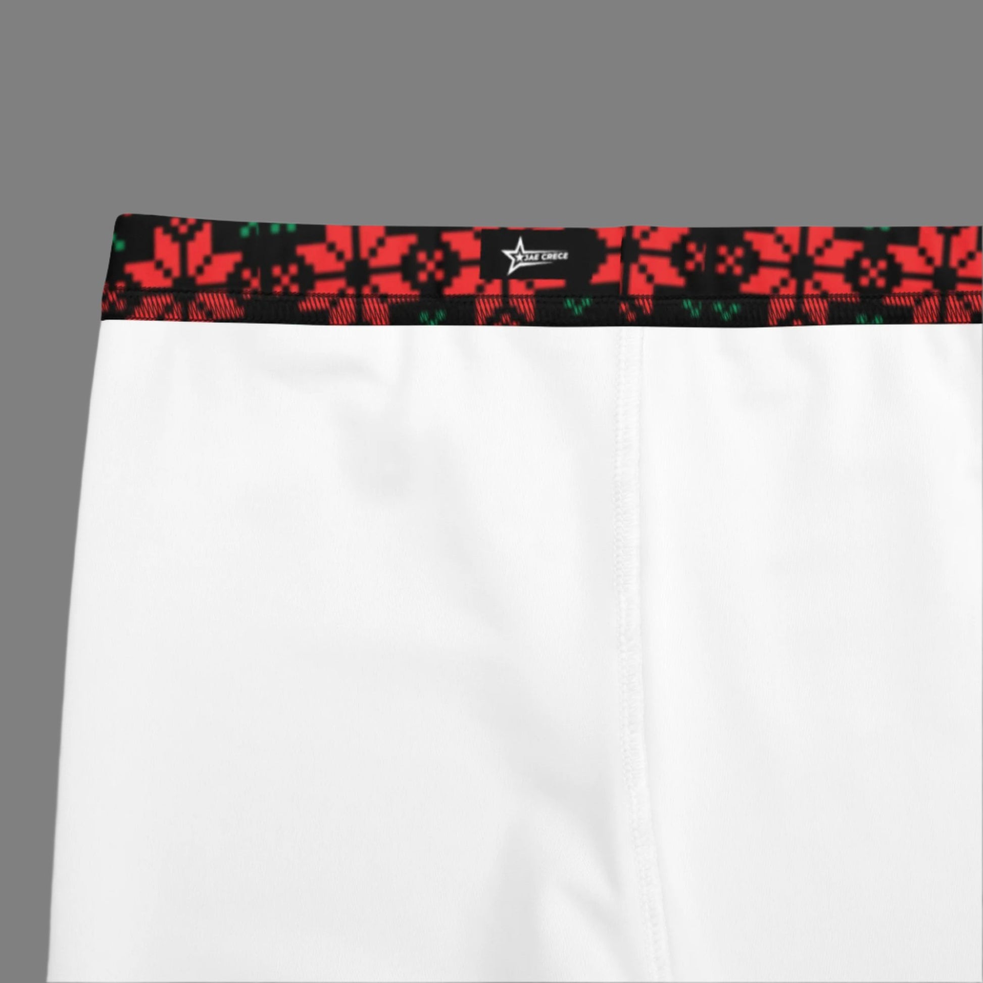 Christmas Poinsettia Toddler Leggings. Sizes 8, 10, 12, 14, 16, 18 and 20. Black leggings with an ugly sweater red and green poinsettia holiday pattern, by jaecrece