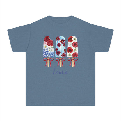 A slate blue short-sleeve t-shirt with a graphic of three floral popsicles for patriotic family holidays. this tshirt may be personalized with a name