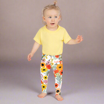 Image: Soft and stretchy toddler leggings in a bright wildflower print designed to celebrate spring. These watercolor floral pants are perfect for girls in sizes 2T to 7. Whether for Easter brunch, flower picking, or cozy weekend wear, they’re the ultimate blend of comfort and cuteness. Coordinate with older girls and women’s versions for a matching set, by jaecrece.