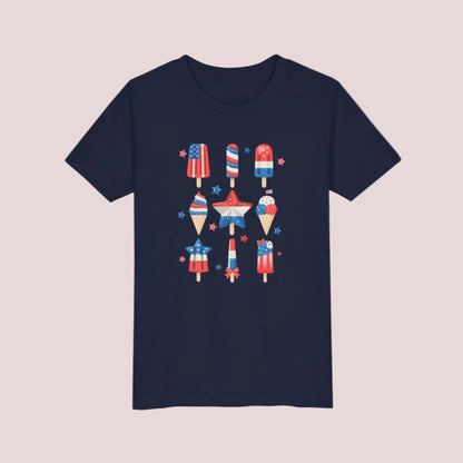 Image: Perfect for Independence Day fun, this child size popsicle shirt comes in S to XL and features a bold red white and blue theme. The colorful graphic adds a cheerful touch to any patriotic outfit, making it great for family barbecues, school events, or summer parties. Let your kid shine in this standout American tee during every holiday celebration, by jaecrece.