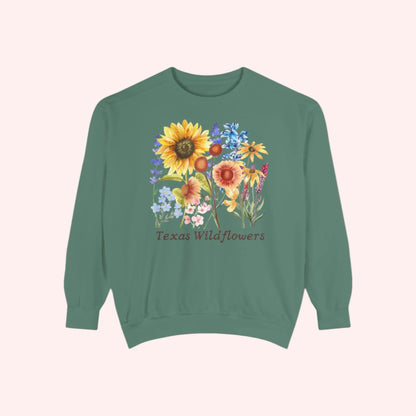 Soft and cozy Texas Wildflowers crewneck sweatshirt printed with a delicate wildflower design. Featuring bluebonnets and coreopsis, this floral fleece top embraces cottagecore, soft girl, and Southern vibes. Great for gifting to moms, daughters, or Texas natives who love springtime blooms, country drives, and nature-inspired fashion. Relaxed fit and breathable fabric for all-day comfort.