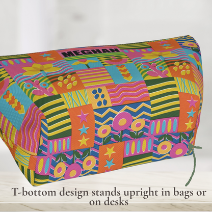 Colorful travel organizer pouch personalized with a custom name and decorated with a cheerful retro floral pattern. Bright flowers, stripes, stars, wavy lines, and geometric shapes create a playful maximalist look. The roomy cosmetic bag is useful for organizing makeup, toiletries, jewelry, hair accessories, or small travel essentials inside a suitcase, tote, backpack, or overnight bag.