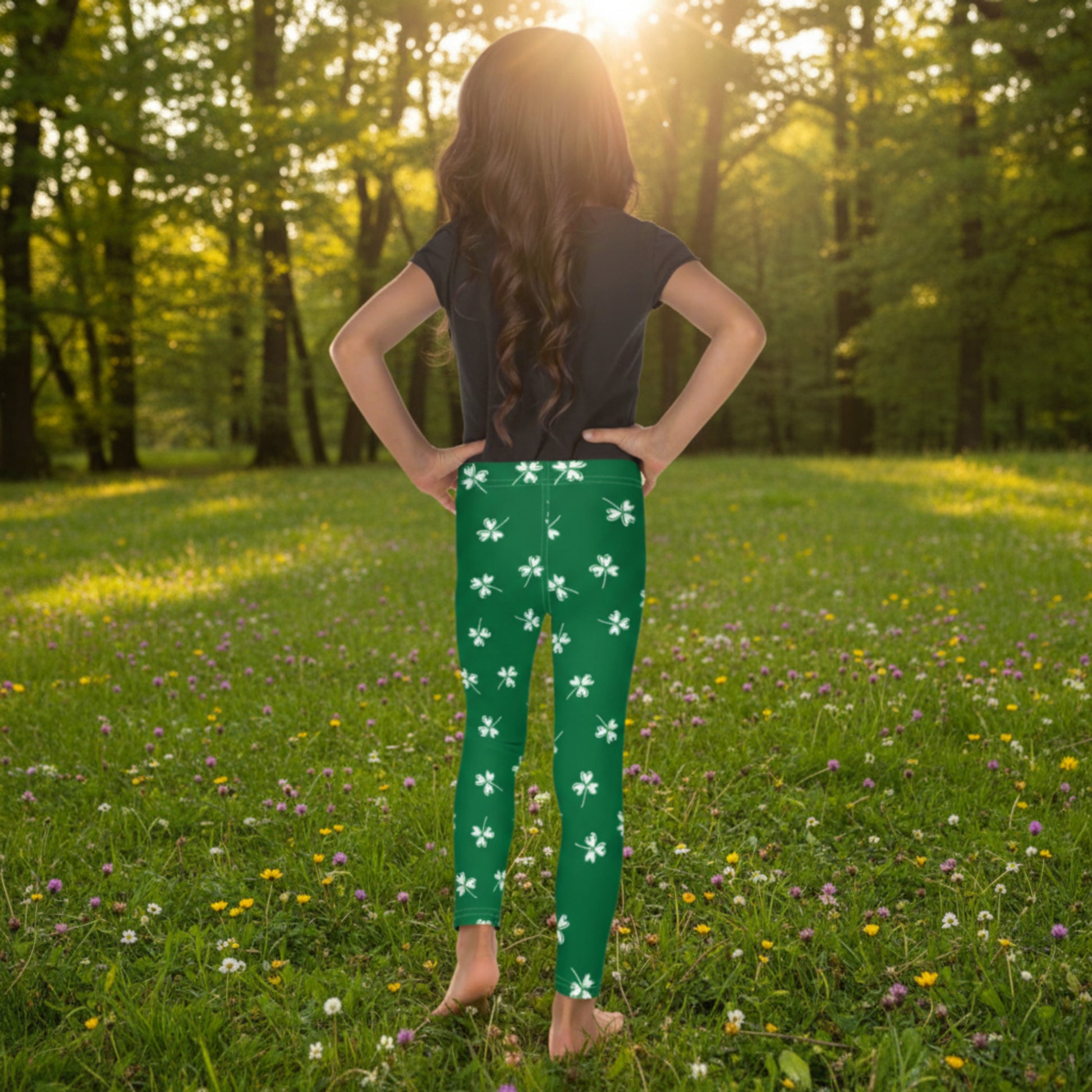 Girls St. Patrick's Day outfit featuring green leggings with lucky clover print, designed for parades, school celebrations, holiday parties, and family photos.