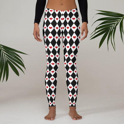 Harlequin Love women's leggings styled as part of a playful Queen of Hearts inspired outfit. The black and white diamond pattern with vivid red hearts complements the dramatic look associated with Wonderland themes and makes these leggings a fun option for Halloween costumes, themed parties, character inspired outfits, or anyone who loves whimsical fashion.