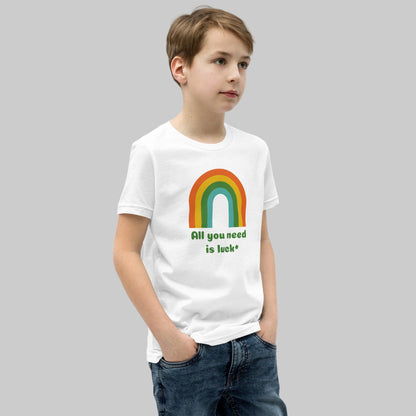 Youth St Patricks Day shirt with All You Need Is Luck phrase and lucky shamrock clover graphic printed on a soft Bella Canvas 3001Y kids t shirt. Comfortable festive holiday clothing for children celebrating St Patrick's Day with family and friends.