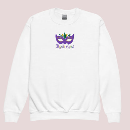 This embroidered Mardi Gras kids sweatshirt is perfect for parade season or school festivities. Featuring a bold purple, green, and gold carnival mask and “Mardi Gras” text, it’s available in youth sizes XS–XL. Designed for comfort and fun, this youth Mardi Gras shirt also comes in adult sizes for matching family outfits. A festive addition to any child’s Mardi Gras wardrobe and perfect for holiday photo ops.