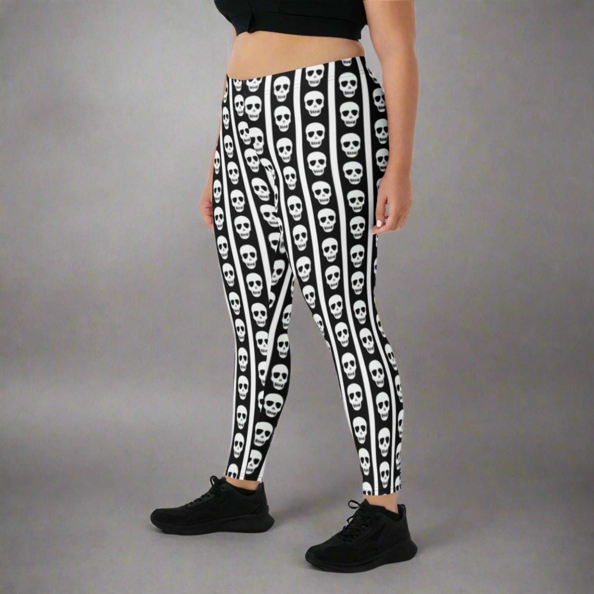 Image: These skull print leggings offer a mix of bold contrast and playful edge. The black and white striped pattern gives a classic circus feel while skull graphics along the legs bring a dark twist. Available in XS to XL, these women’s leggings are perfect for themed parties, unique streetwear looks, or anyone embracing bold fashion with personality, by jaecrece.

