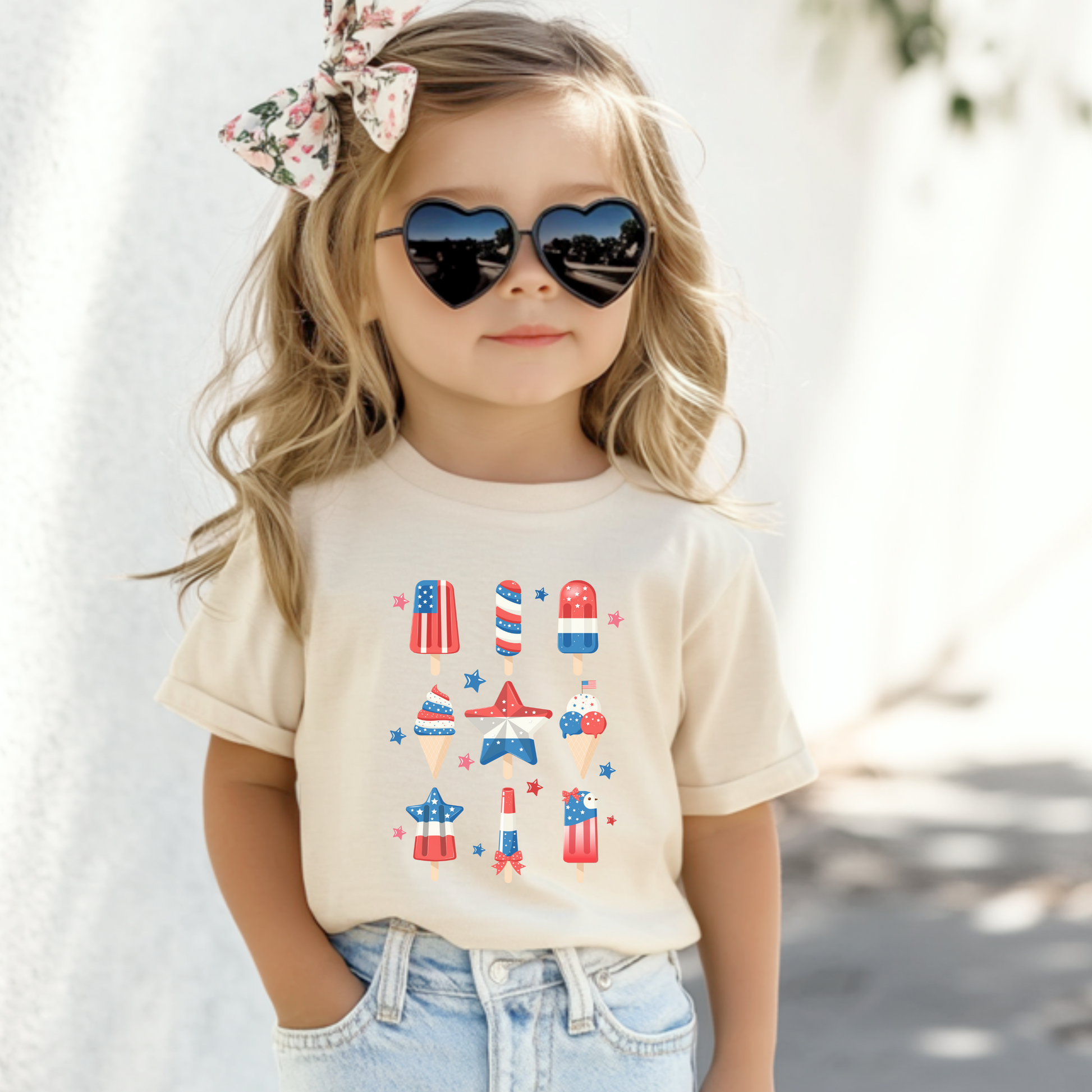 Image: Celebrate summer with this adorable patriotic popsicle shirt for toddlers in sizes 2T to 5T. Perfect for July 4th cookouts and Memorial Day parades, this red white and blue tee features a cute frozen treat that little ones will love. Ideal for holiday photos and family matching looks, this comfy top adds a pop of fun to any toddler's patriotic outfit, by jaecrece.