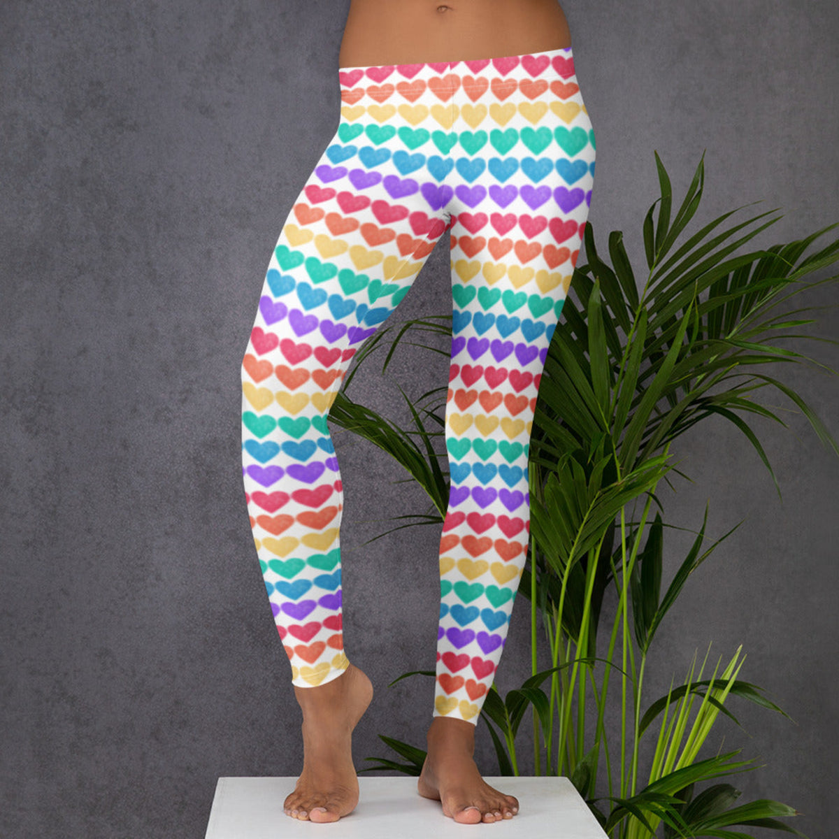 Designed for bold spirits, these full-length Women’s Rainbow Hearts Leggings are perfect for colorful celebrations. Featuring rows of vibrant rainbow hearts and a flattering mid-rise cut, they’re ideal for Pride, festivals, or everyday fashion. The soft fabric hugs the body comfortably while the bright print spreads joy. Also available in toddler and youth sizes for matching looks.